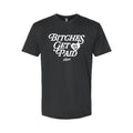A black short-sleeve crewneck t-shirt with a white graphic print on the front reading 'BITCHES GET PAID' in a stylized font, with a small heart containing 'EST. 19' and 'HBM' underneath